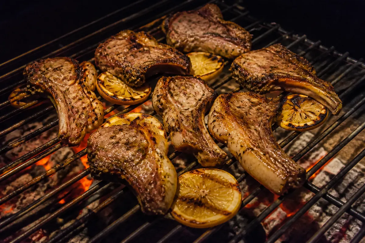 Lamb tjops and lemon over open coals